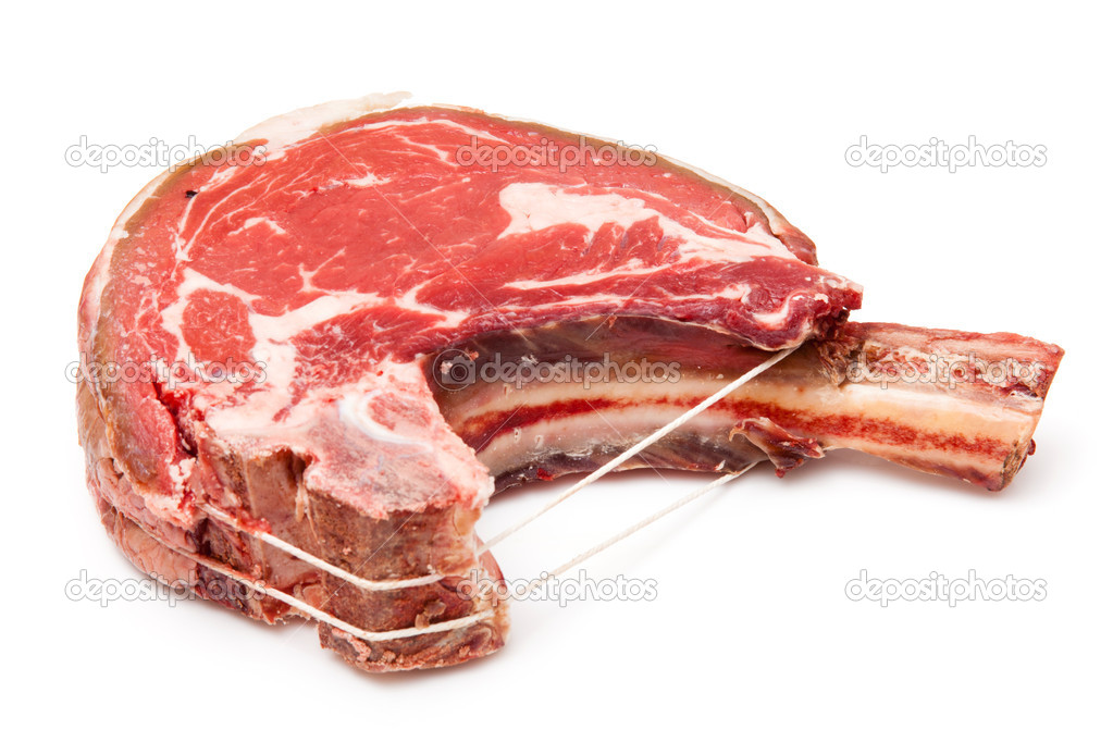 Rib of beef joint isolated on a white background.