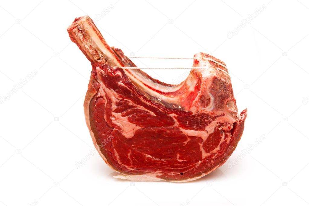 Rib of beef joint isolated on a white background.