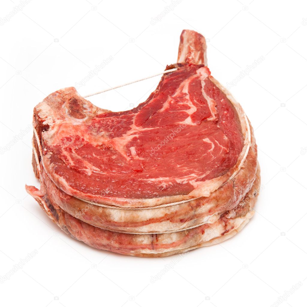 Rib of beef joint isolated on a white background.