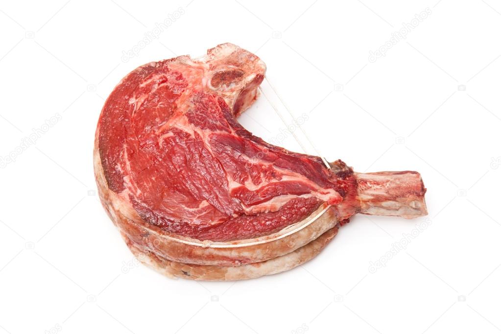 Rib of beef joint isolated on a white background.