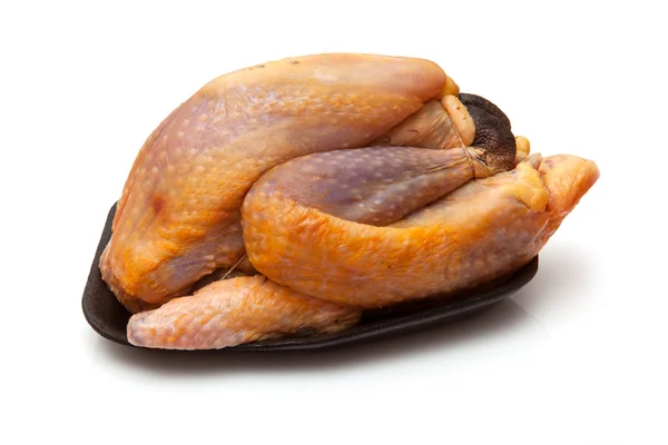 Beyaz stüdyo arka plan üzerinde domuz güveci.