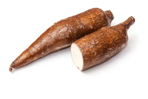 Radici di yucca manioca Foto Stock Royalty Free