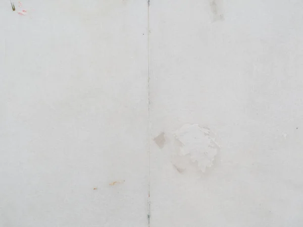 Duvardaki dikey beyaz bilye. Mermer döşeme dokusu