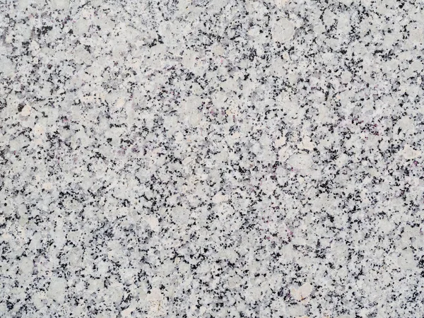 Duvardaki beyaz granit. Granit döşeme dokusu