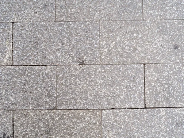 Duvardaki beyaz granit. Granit döşeme dokusu