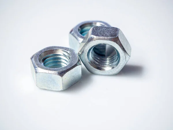 Chrome Plated Metal Nuts White Background Technology Concept Image — 스톡 사진
