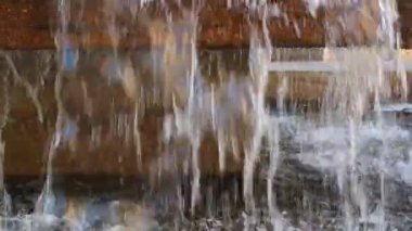 waterfall of a fountain in a public park. Concept of freshness. High quality FullHD footage