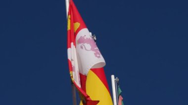 European and Spanish flags on the roof of a building in Europe hd image