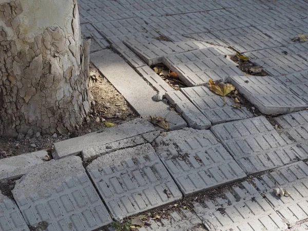 Uneven Sidewalk Tiles Potholes Insecurity Risk Image — Stock Photo, Image