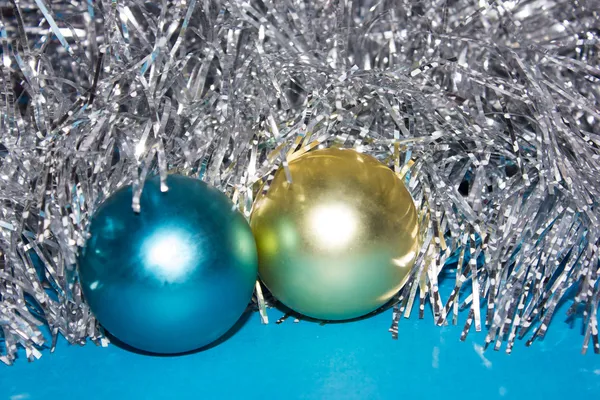 Tinsel with toys — Stock Photo, Image