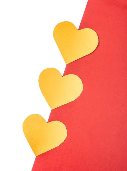 Corações laranja no fundo branco e vermelho — Fotografia de Stock