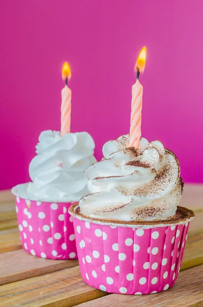 White cream cupcake with candle — Stockfoto