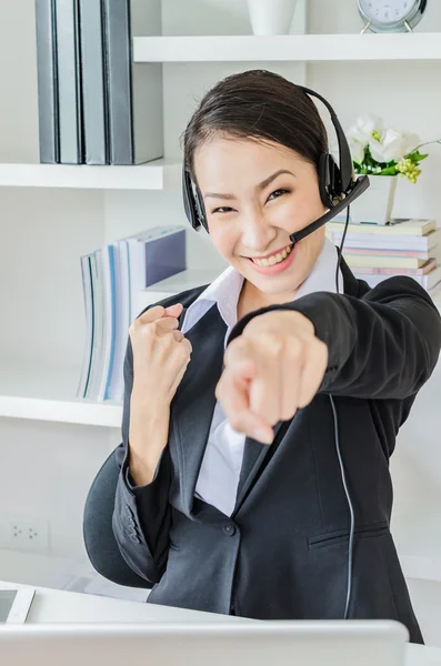 Business women with headphone — Stock Photo, Image