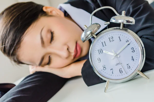 Young business women sleeping in office — Stock Photo, Image