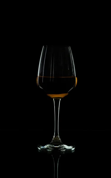 Wine glass in blackdrop — Stock Photo, Image