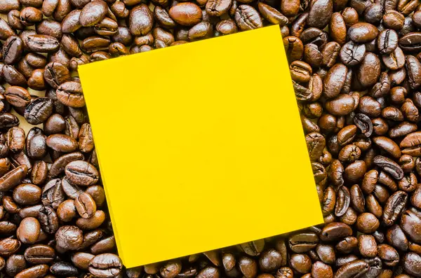 Note&coffee beans — Stock Photo, Image