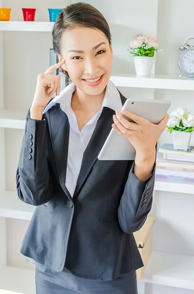 Young business woman use tablet