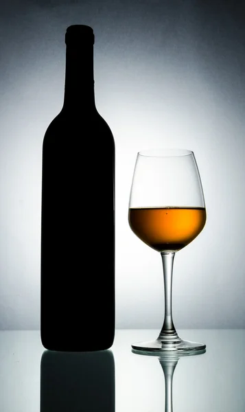 Bottle and wine glass — Stock Photo, Image