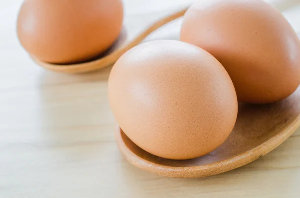 Eggs on the wood table — Stock Photo, Image