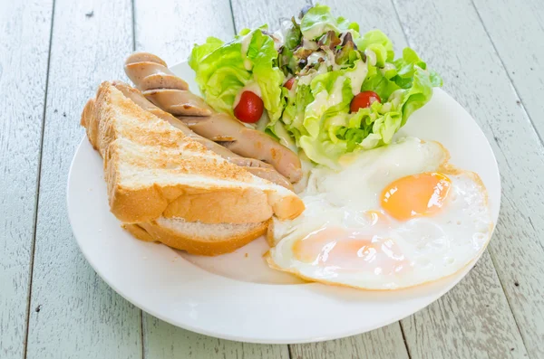 Breakfast on wood table — Stock Photo, Image