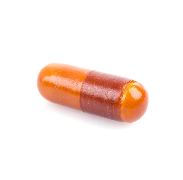 Pilulka na bílém pozadí — Stock fotografie
