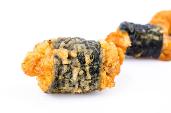 Chicken roll and seaweed on white background — Stock Photo, Image