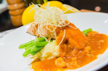 Fish steak with sauce