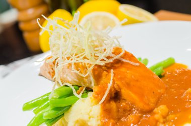 Fish steak with sauce