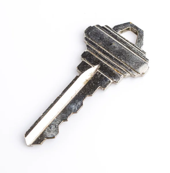 Κλειδί σε απομονωμένες άσπρο φόντο — Φωτογραφία Αρχείου