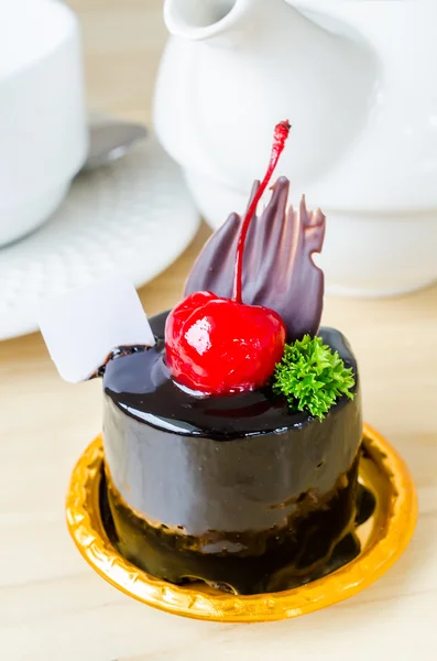 Chocolate cake with cherry — Stock Photo, Image