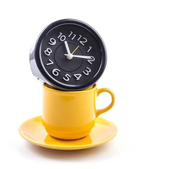 Yellow mug and clock — Stock Photo, Image