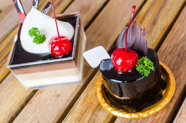 Chocolate cake with cherry — Stock Photo, Image