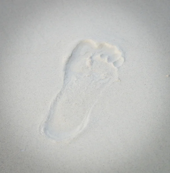 Печать ног на пляже — стоковое фото