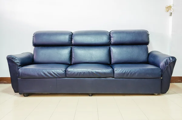 Black leather sofa — Stock Photo, Image