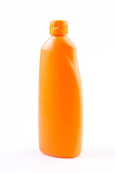 Oranje schoonmaak fles op geïsoleerde witte achtergrond — Stockfoto