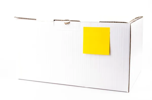 Yellow note on white box — Stock Photo, Image