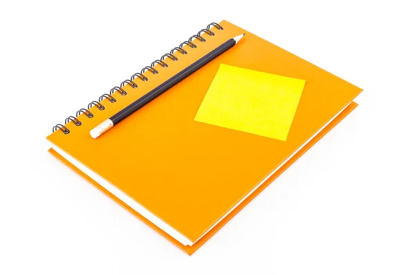 Note pad on notebook and pencil — Stock Photo, Image