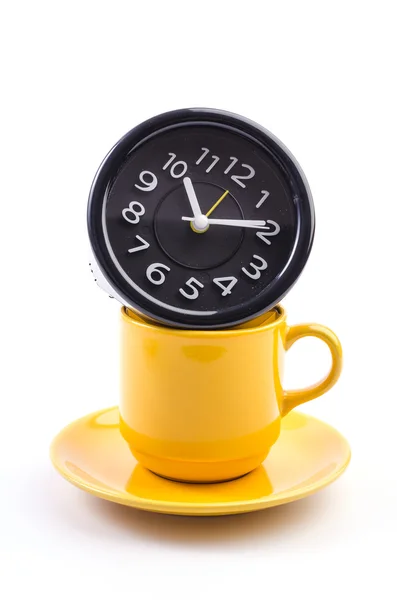 Yellow mug and clock — Stock Photo, Image