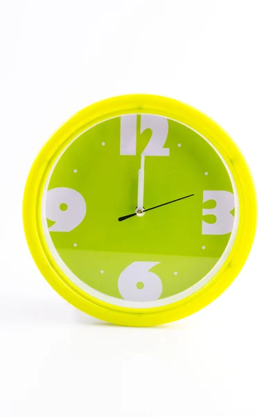 Alarme de relógio verde isolado no fundo branco Imagens Royalty-Free