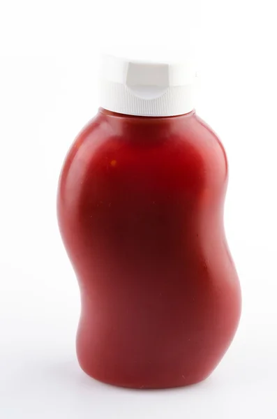 Bottiglia di salsa di pomodoro isolato sfondo bianco — Foto Stock