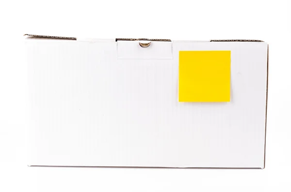 Gele opmerking over witte doos — Stockfoto