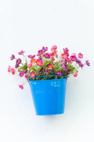 Plastic flowers in vase — Stock Photo, Image