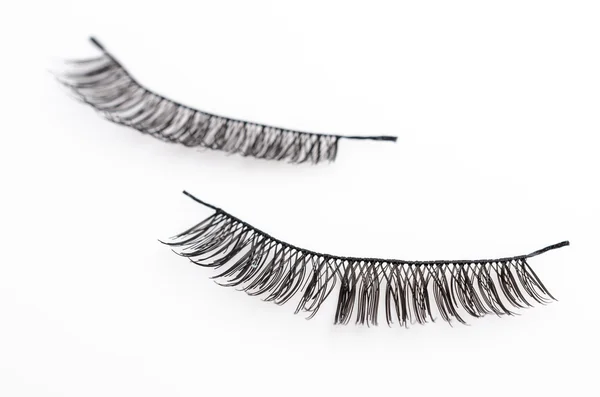 Eyelashes on white — Stock Photo, Image