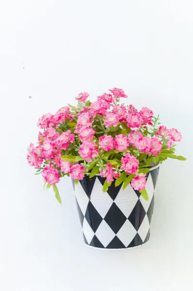 Plastic flowers in vase — Stock Photo, Image