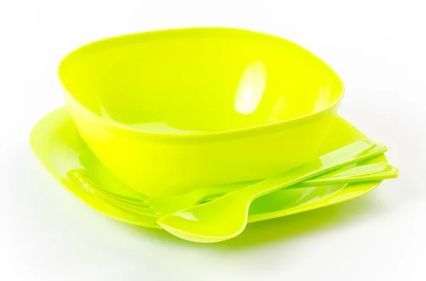 Cuenco de plástico verde, tenedor y cuchara — Foto de Stock
