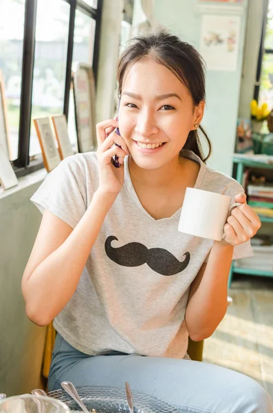 Girl in coffee shop — Stock Photo, Image