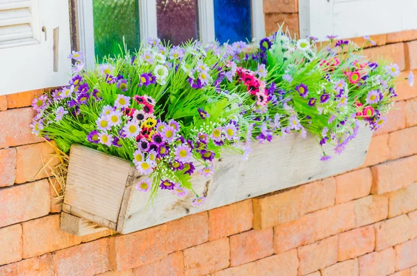 Plastic flowers in vase — Stock Photo, Image