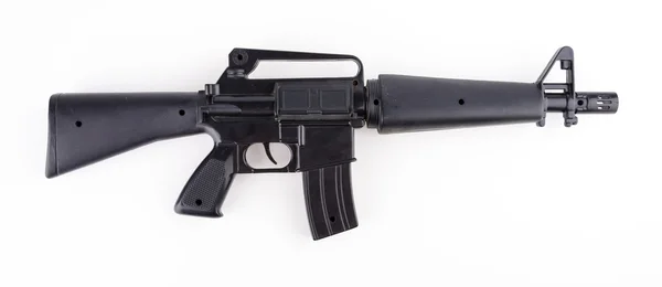 Arma de plástico preto — Fotografia de Stock