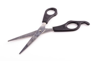Scissors on white