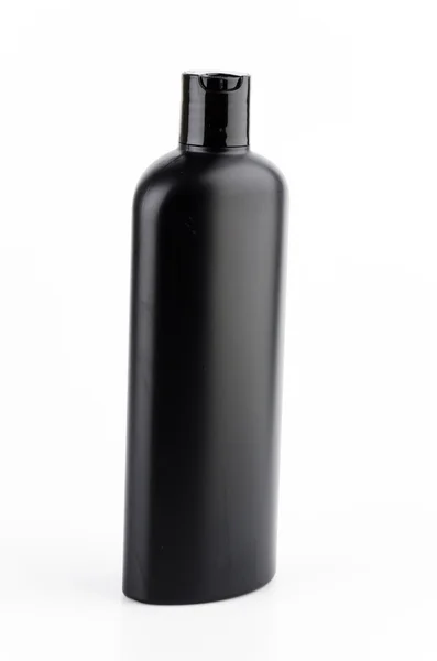 Black plastic bottle lotion — Stock Photo, Image